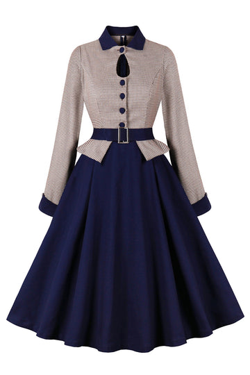 Vestido de manga larga con cinturón azul marino de la década de 1950